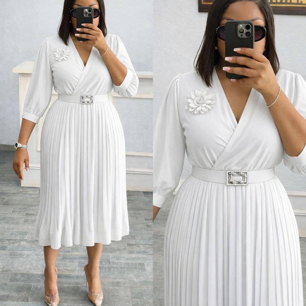 Ensemble veste structurée et jupe plissée midi